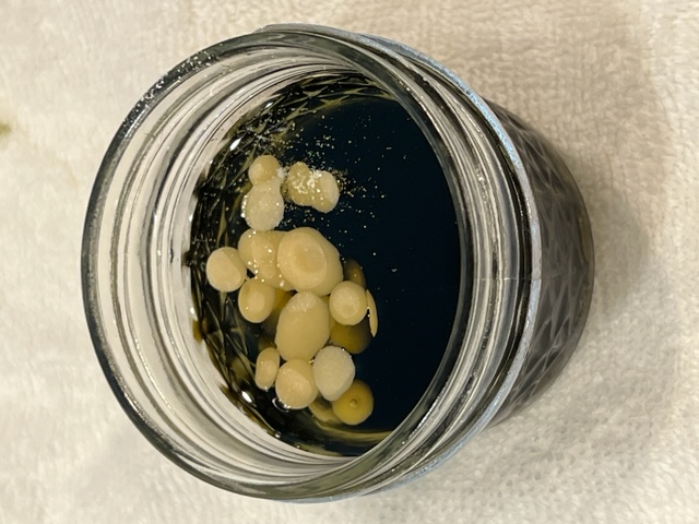 Bees wax pellets prior to heating